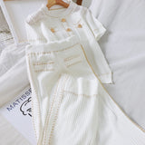 Ebbgo  -  New Summer White/Black Knitted Women Two Piece Set Elegant Short Sleeve O-neck Casual Tops Shirts And Loose Pants Suits