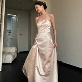 Ebbgo   -  Elegant Light Luxury Satin Wedding Dess New Women's Simple Champagne Strapless Backless Floor Length A-Line Beaded Vestido