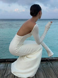 Ebbgo  -  Elegant Open Back Beach Knitted Maxi Dress Women Sexy Round Neck Long Sleeve Slim Vestidos Fashion Summer Vacation Female Robes