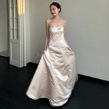 Ebbgo   -  Elegant Light Luxury Satin Wedding Dess New Women's Simple Champagne Strapless Backless Floor Length A-Line Beaded Vestido